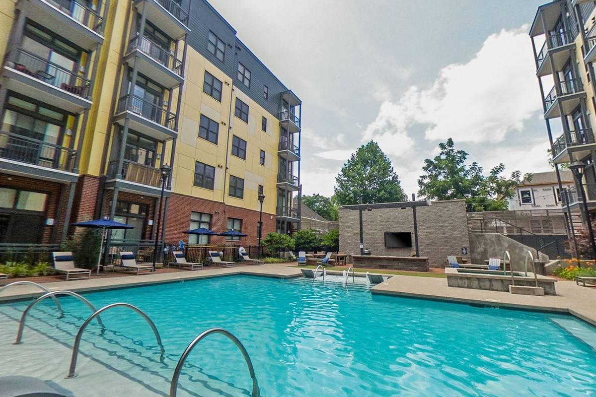The courtyard and pool of the Hollis Court apartment building
