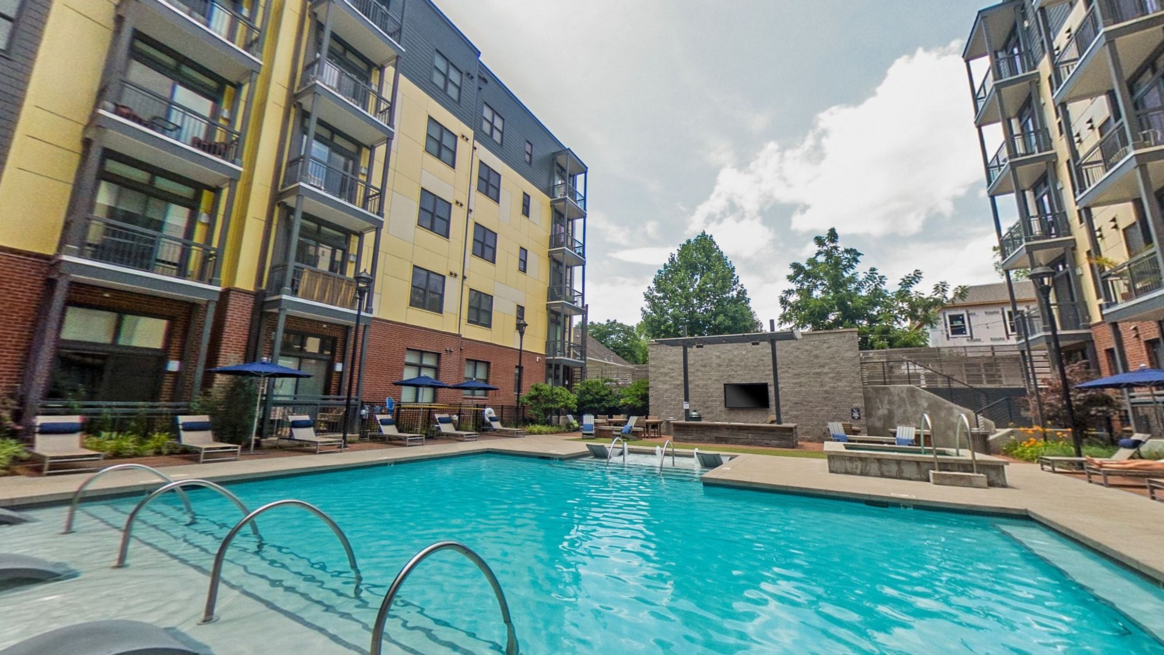 The courtyard pool with the apartment blocks rising on either side and open sky between them