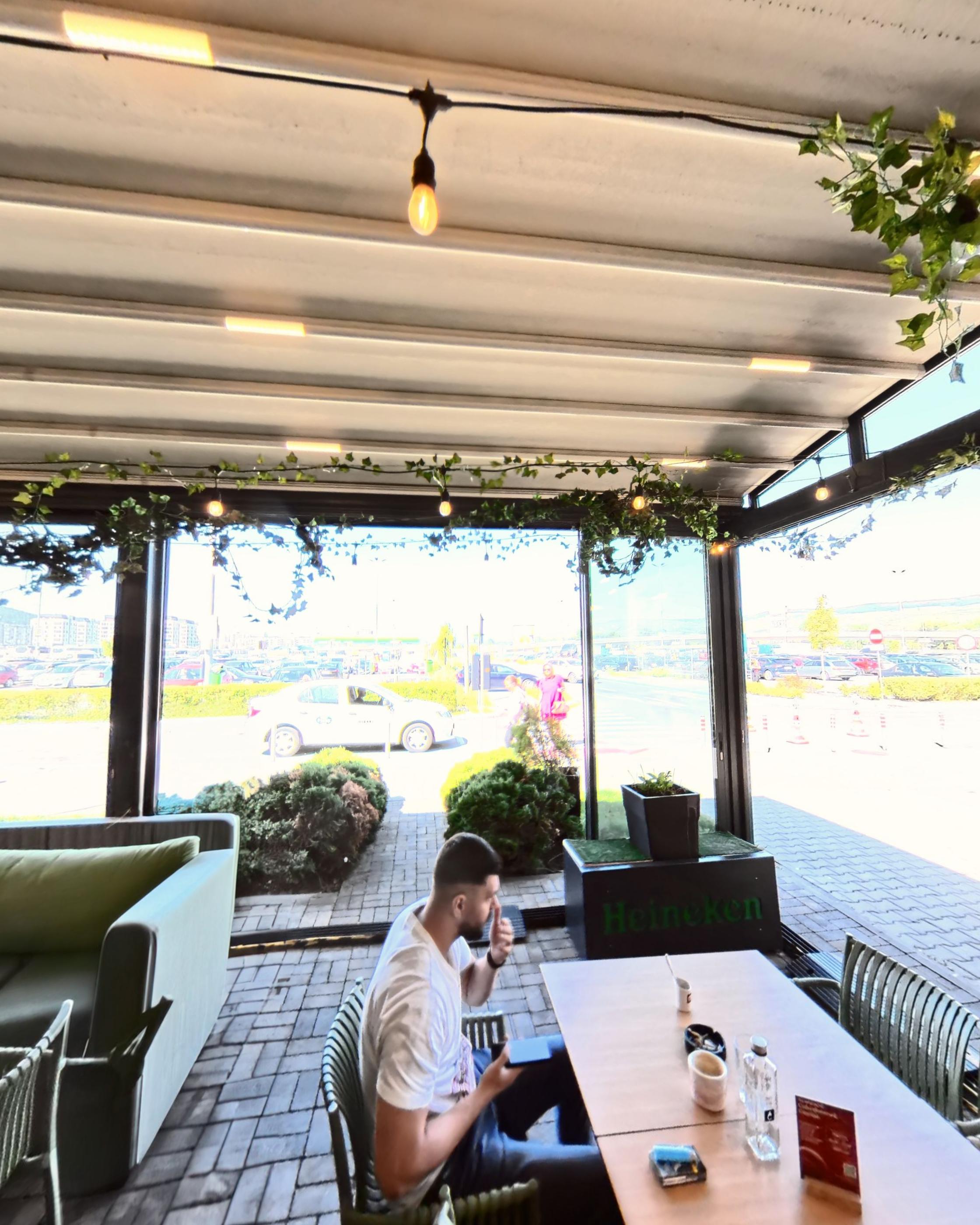 The open front of the terrace looking out to the daylight