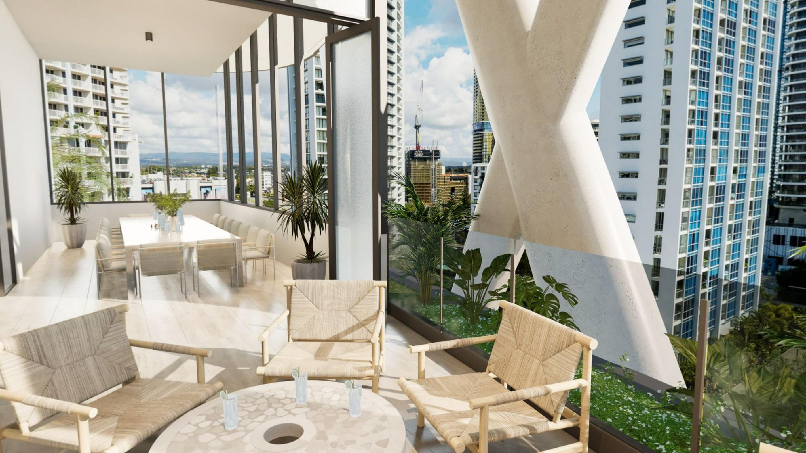 An open sided garden lounge with armchairs and tables, city towers beyond