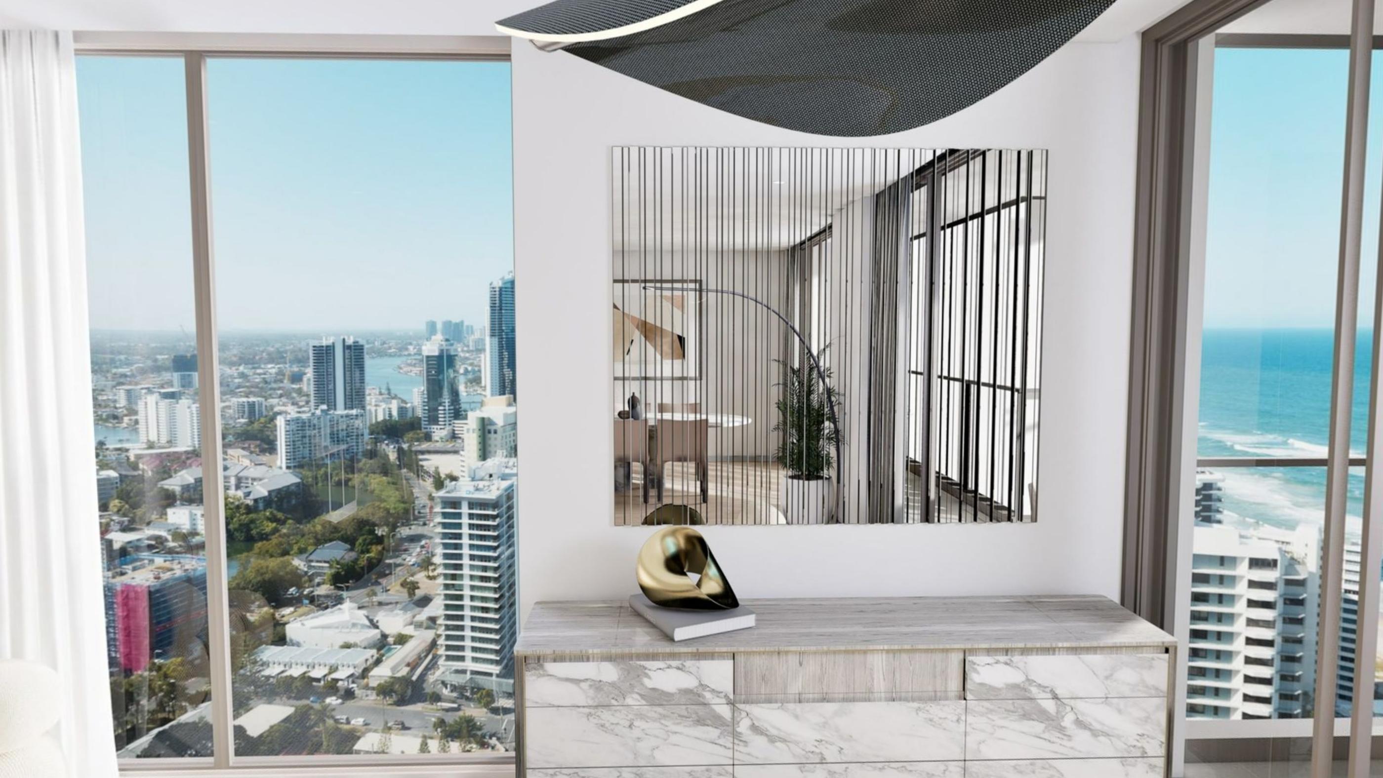 A glazed corner with a marble console, city towers on one side and the sea on the other